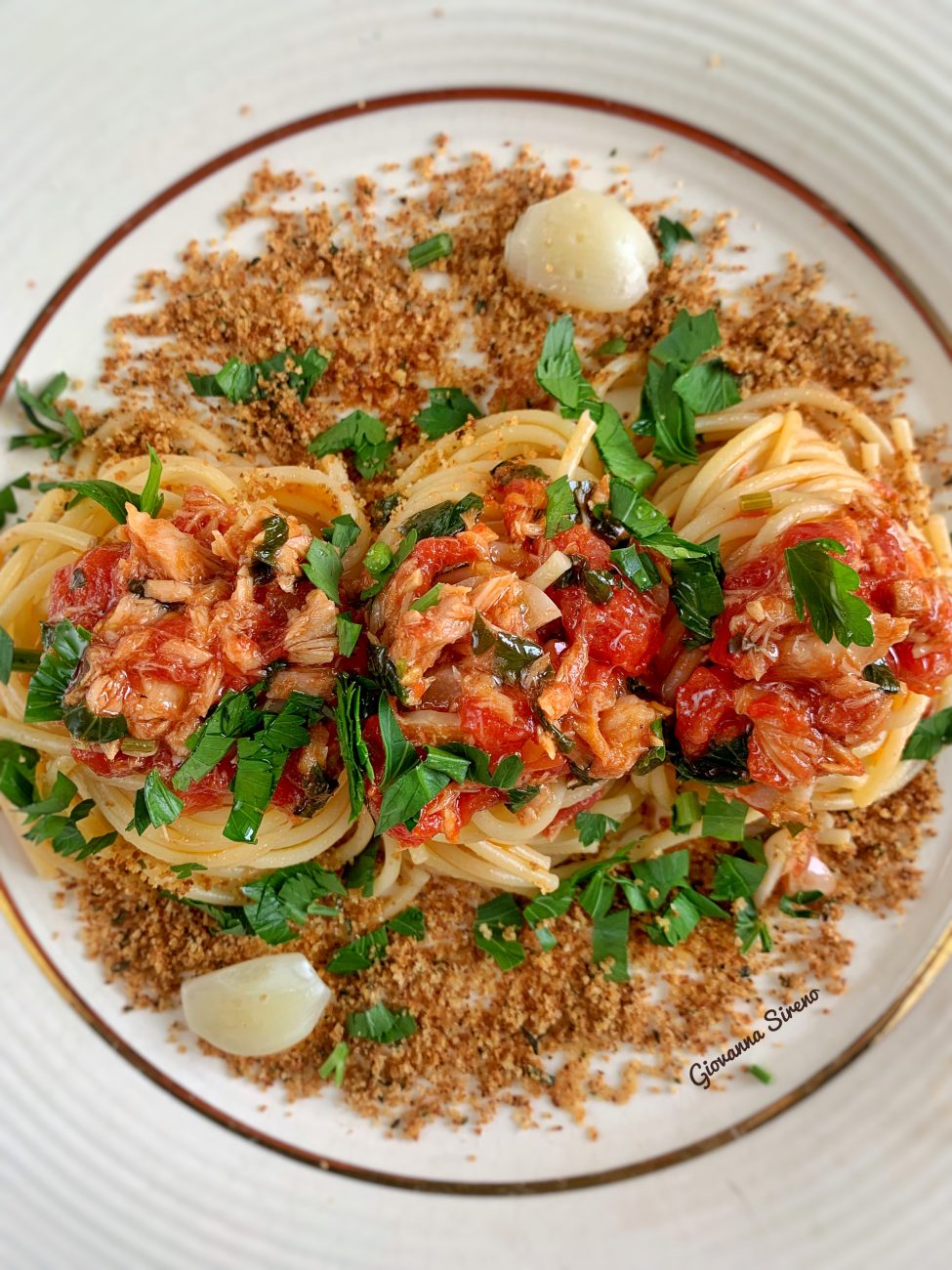 Pasta ammuddicata with tonno, anchovies, and plum tomatoes